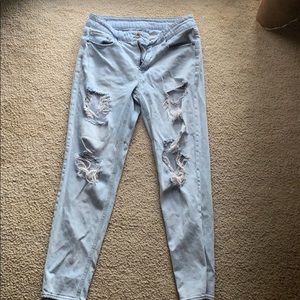 Torn light blue boyfriend jeans